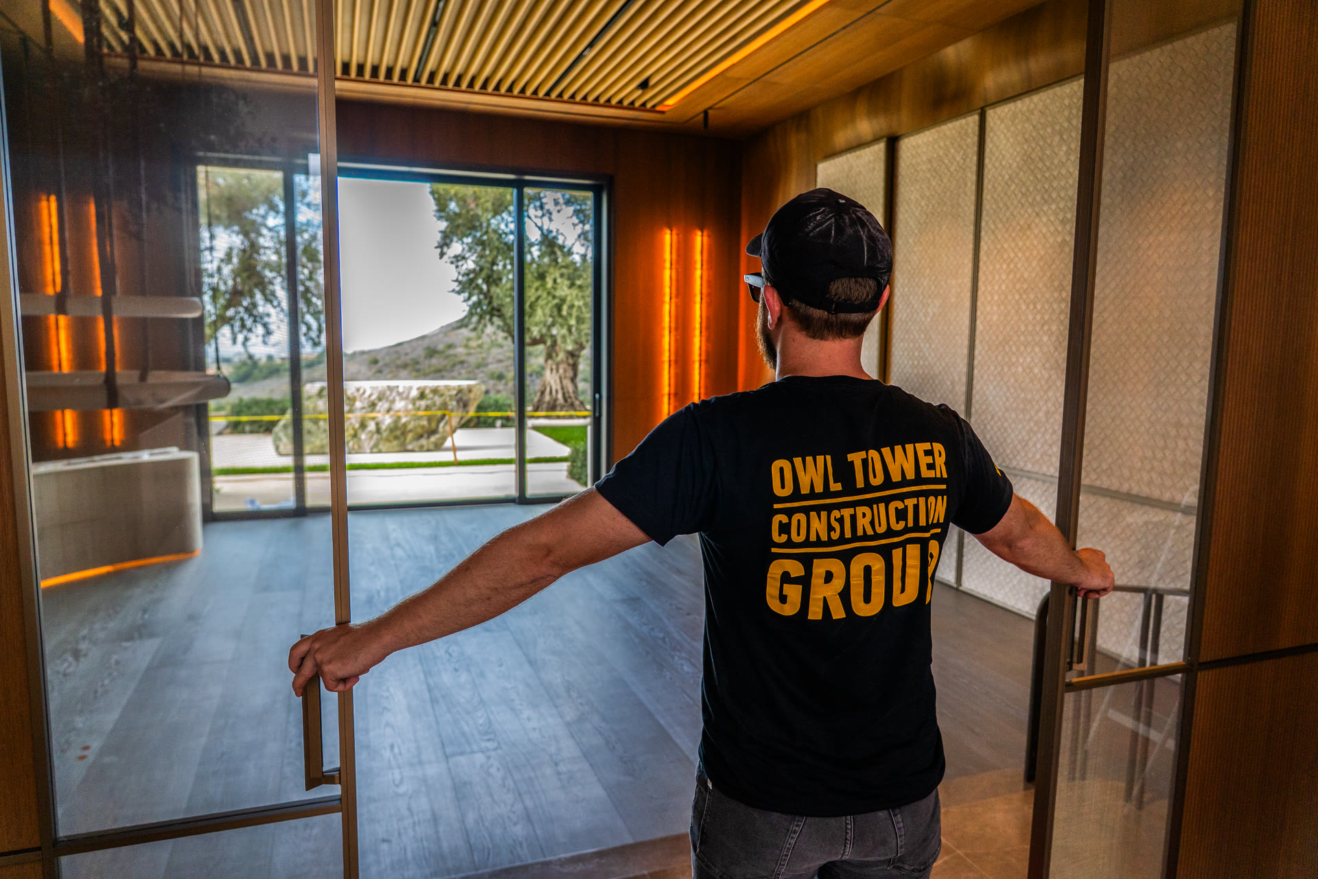 Team member inspecting luxury interior finish